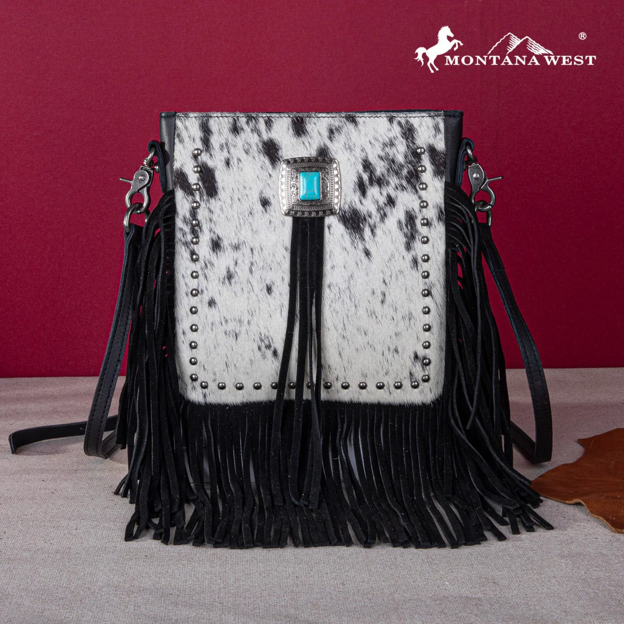 The Paradise Ridge Cowhide Fringe & Stud Purse by Montana West
