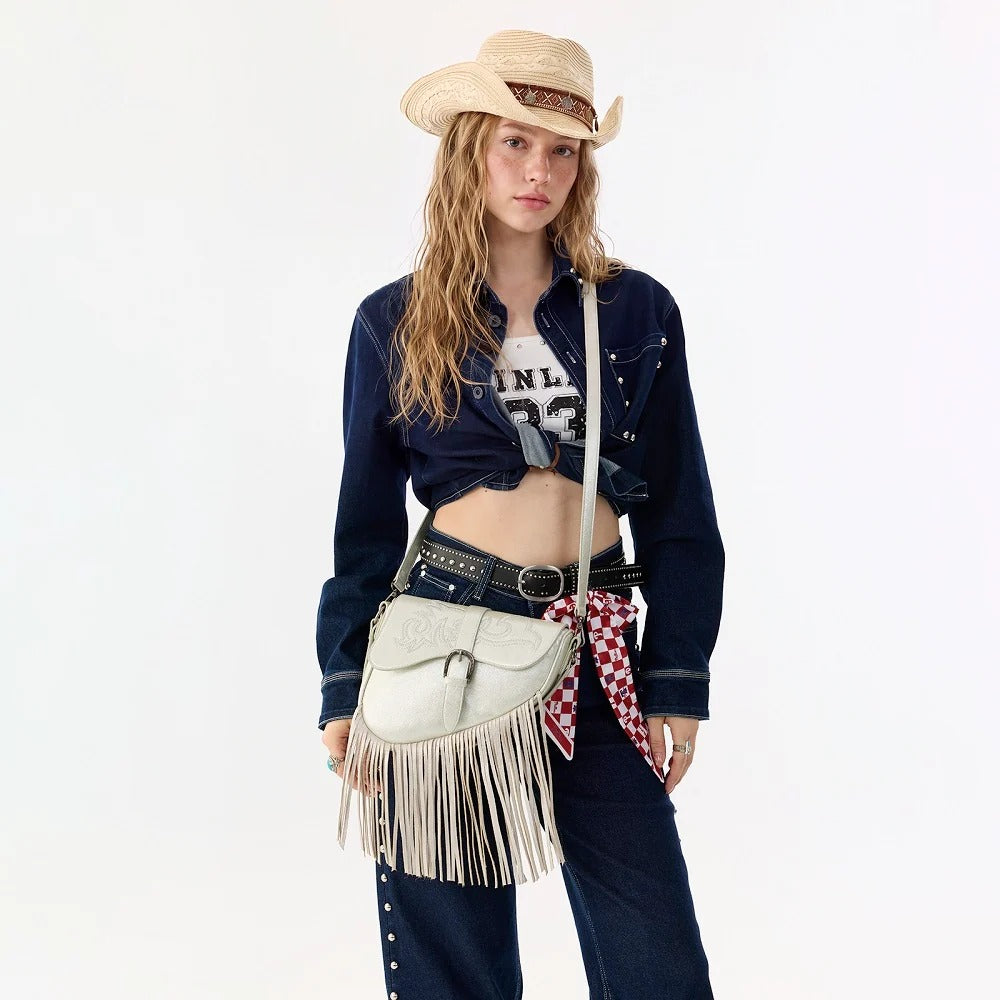 The Rhinestone Cowgirl Fringe Saddle Bag in Platinum by Wrangler