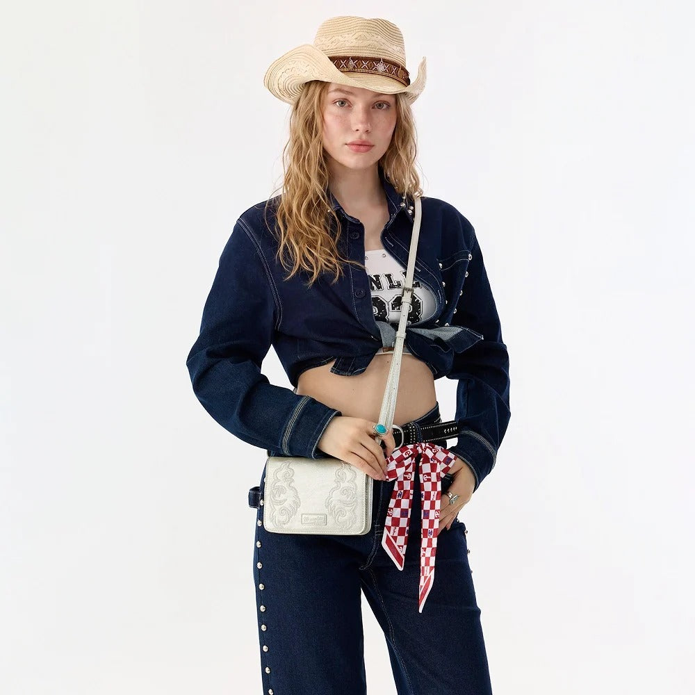 The Rhinestone Cowgirl Embroidered Cross Body Bag by Wrangler in Platinum