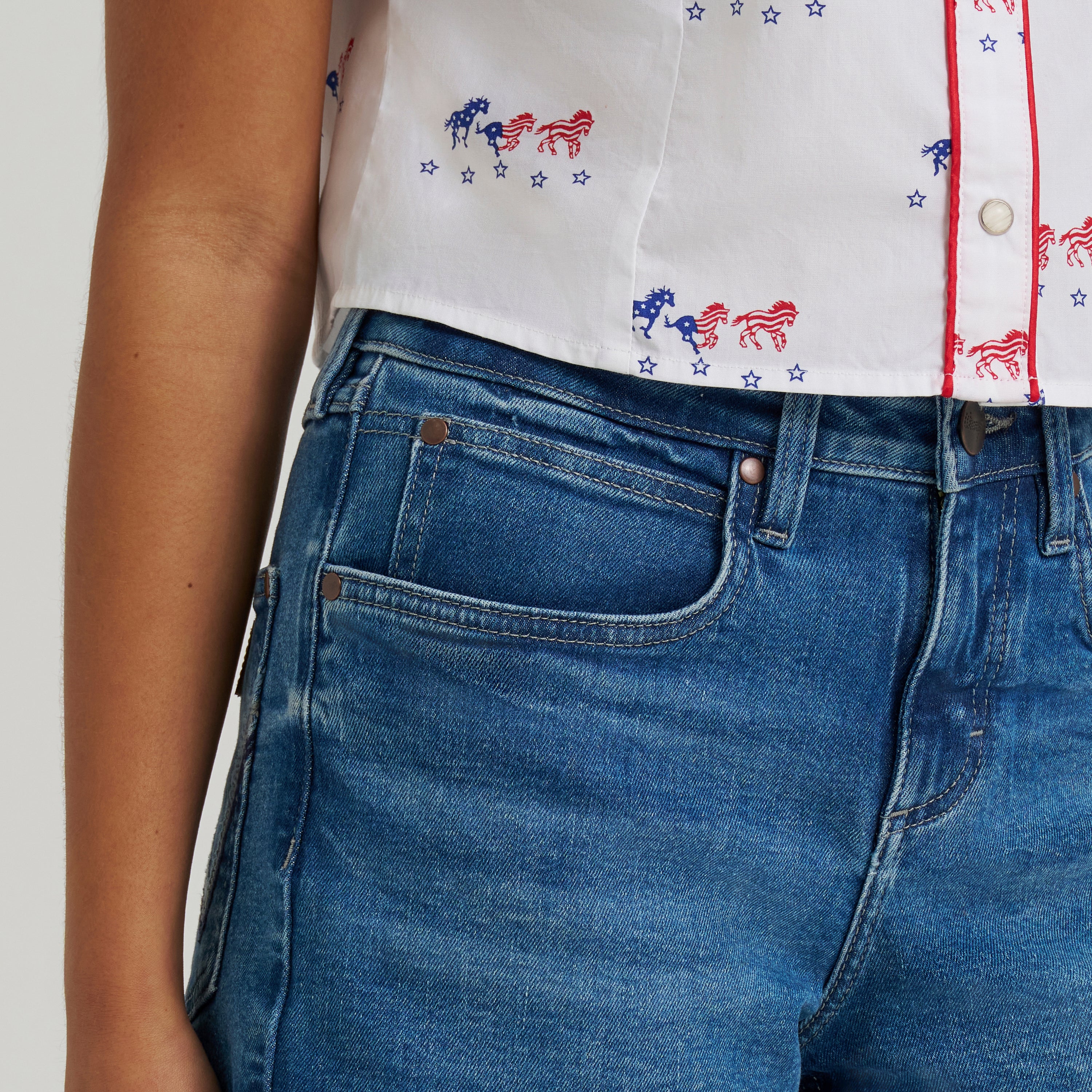 The Peppermint Cowgirl Mae Mid Rise Shorts by Wrangler
