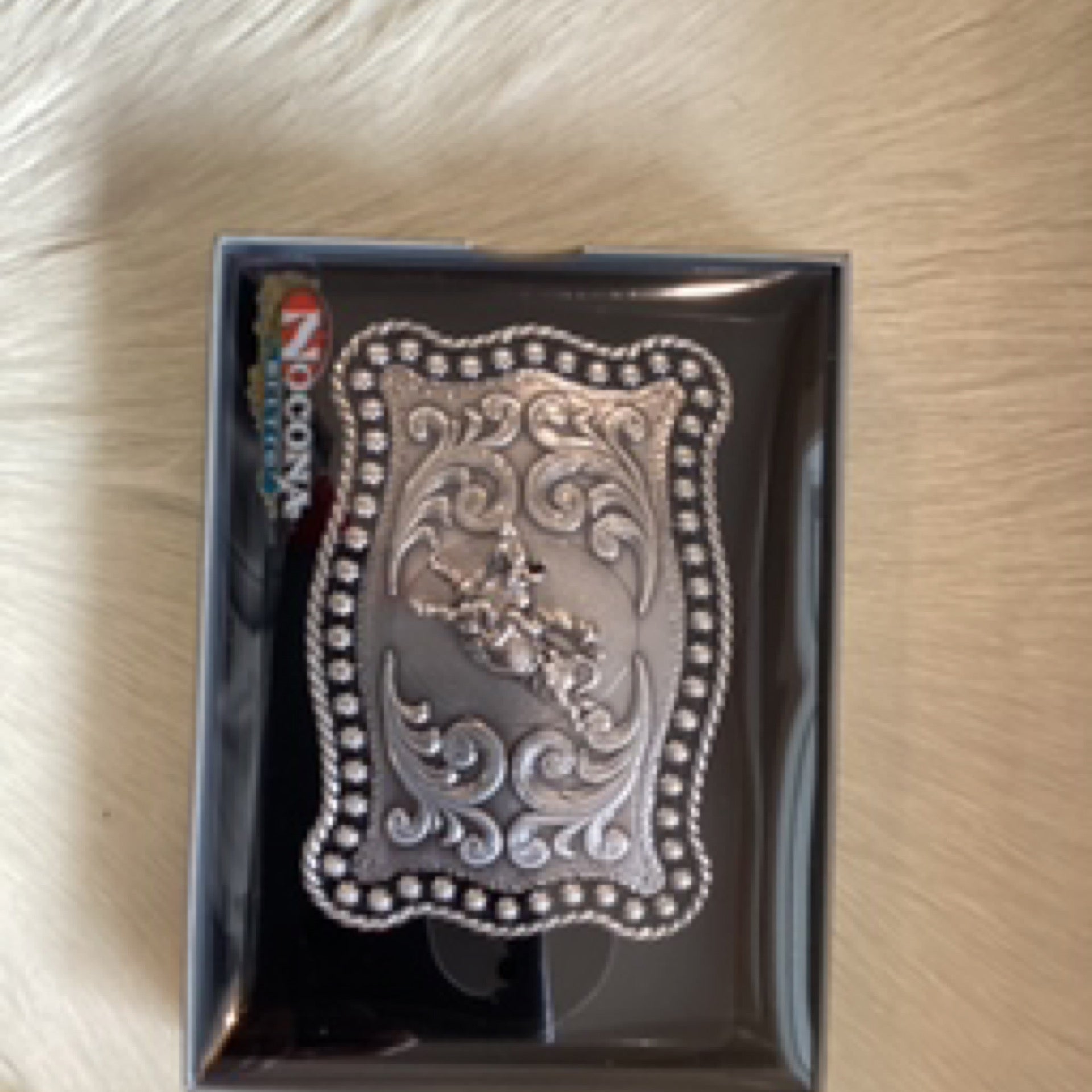 The Classic Bull Rider Belt Buckle by Nocona