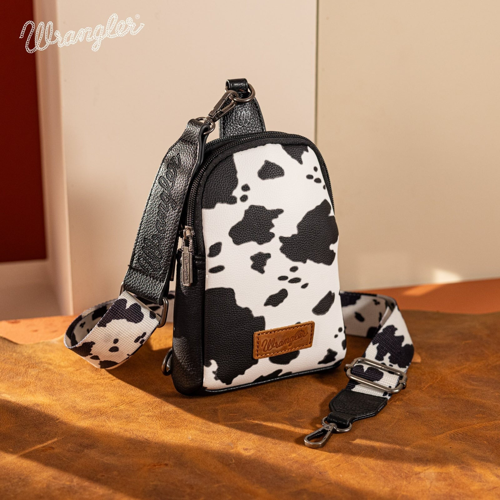The Dairy Delight Crossbody Sling Bag by Wrangler in Black/White