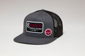 Next Level Trucker Hat by Kimes Ranch in Charcoal