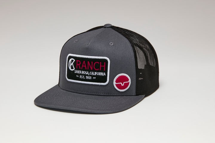 Next Level Trucker Hat by Kimes Ranch in Charcoal