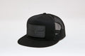 Banner Trucker Hat in Black by Kimes Ranch