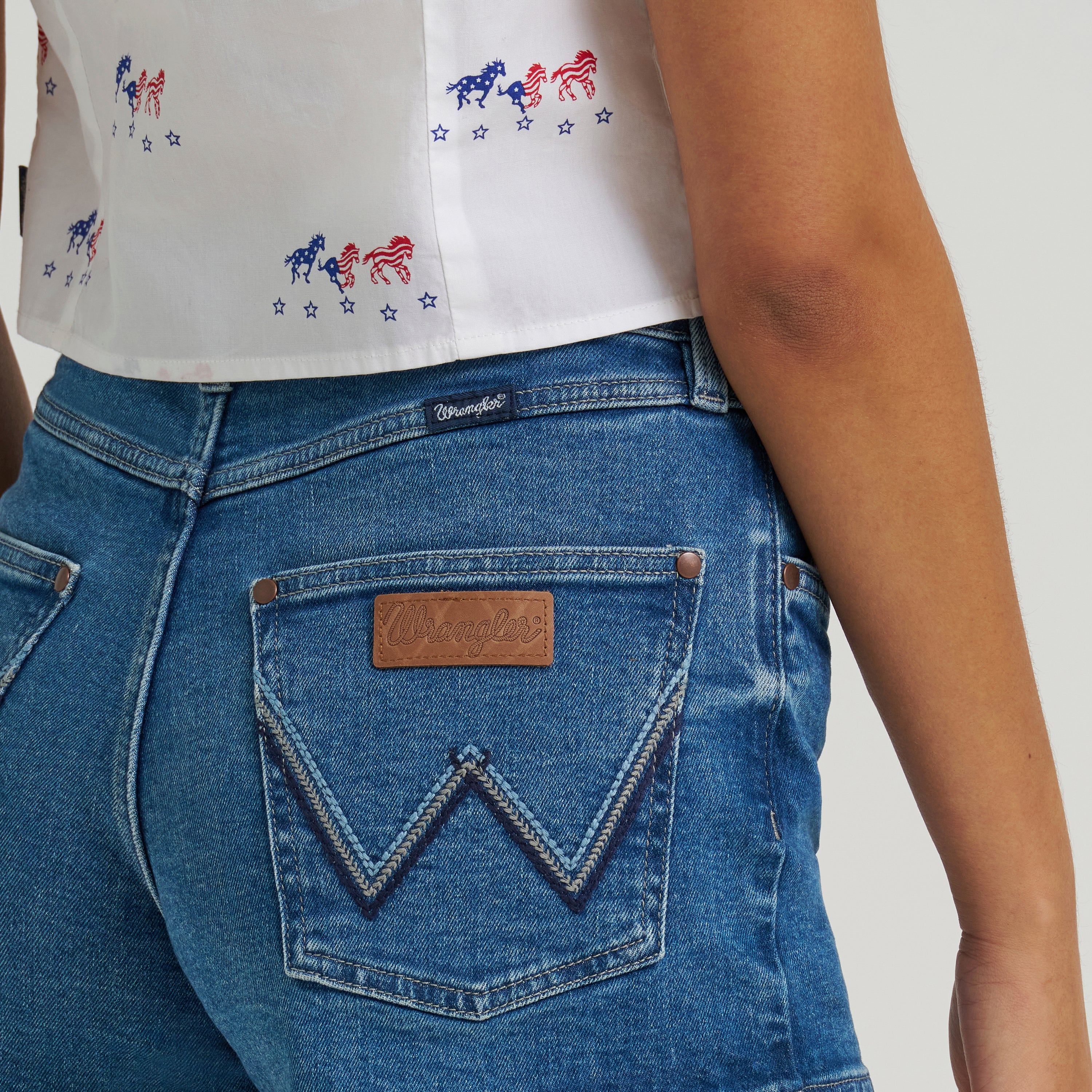 The Peppermint Cowgirl Mae Mid Rise Shorts by Wrangler