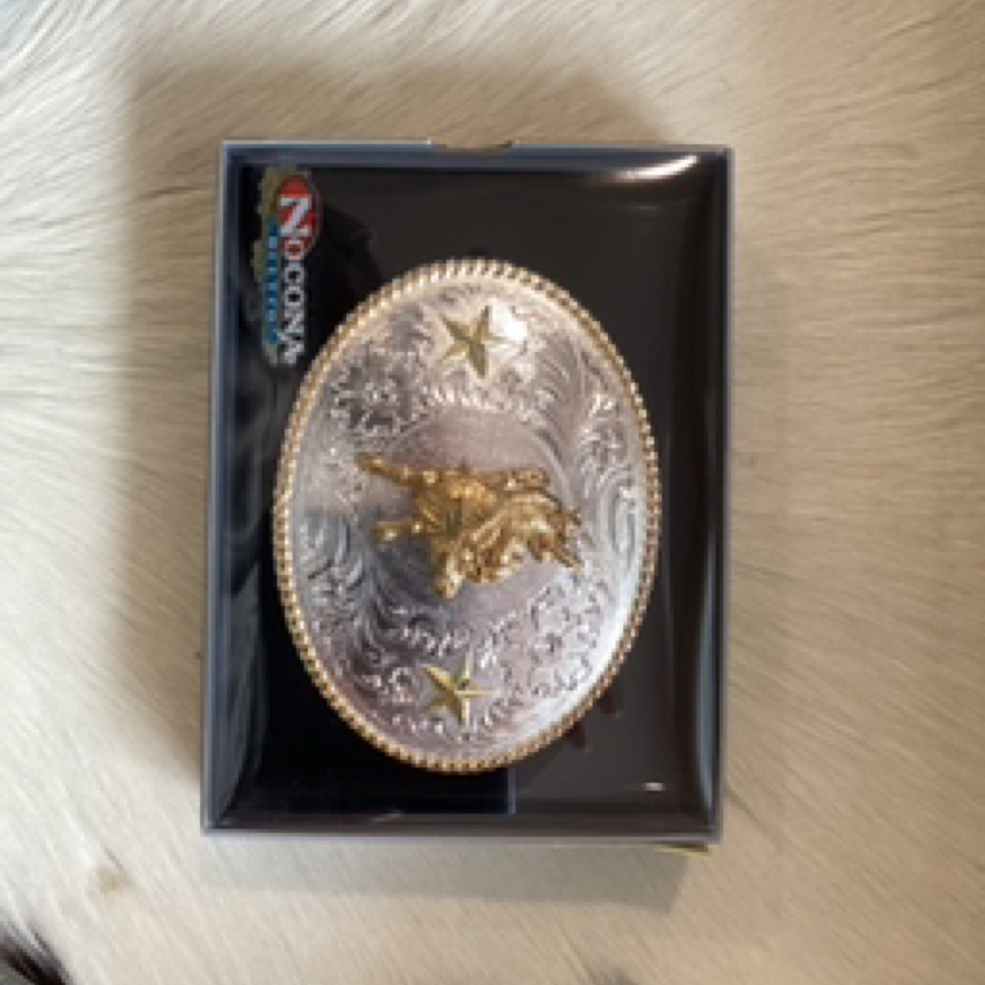The Rowdy Roughstock Belt Buckle by Nocona