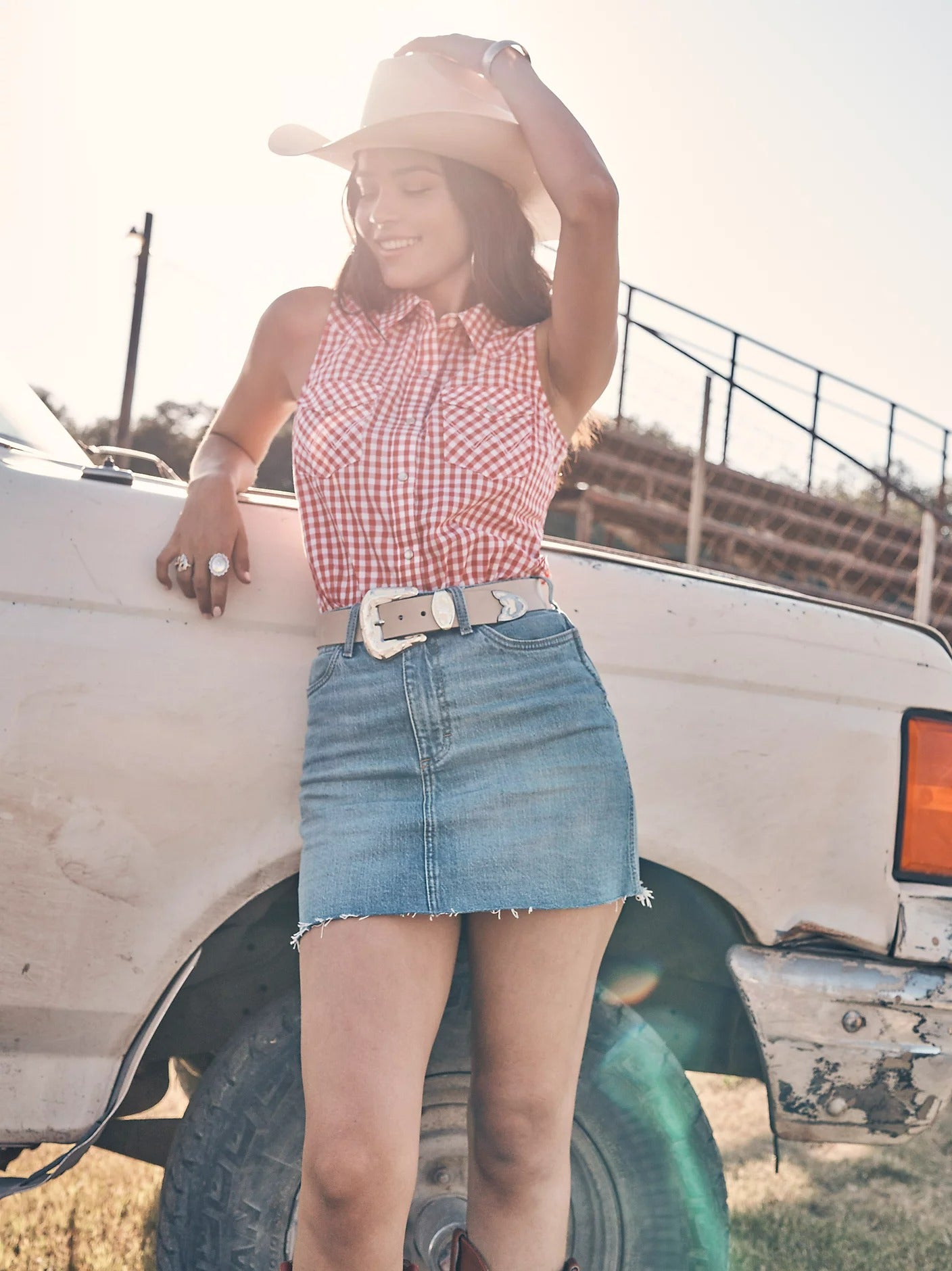 The Lucy Gingham Pearl Snap Sleeveless Shirt by Wrangler
