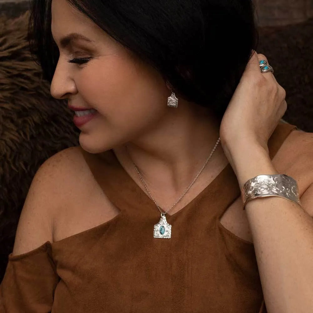 Chiseled Cow Tag Earrings by Montana Silversmiths